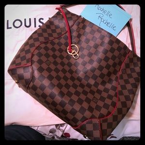 Louis  Vuitton Caissa hobo.